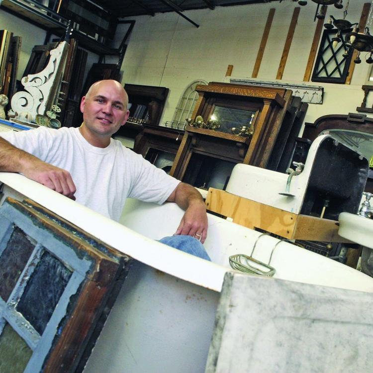 Carpenter recycles salvage for profit and preservation